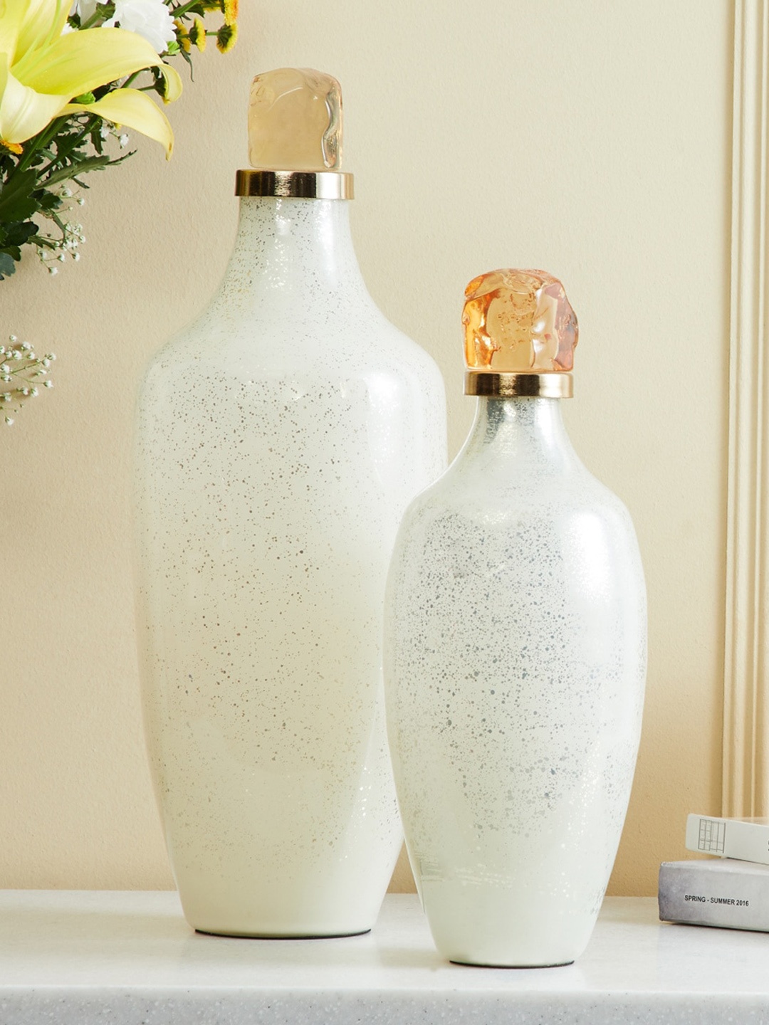 

Home Centre Eternity Off White Printed Glass Canister With Resin Lid