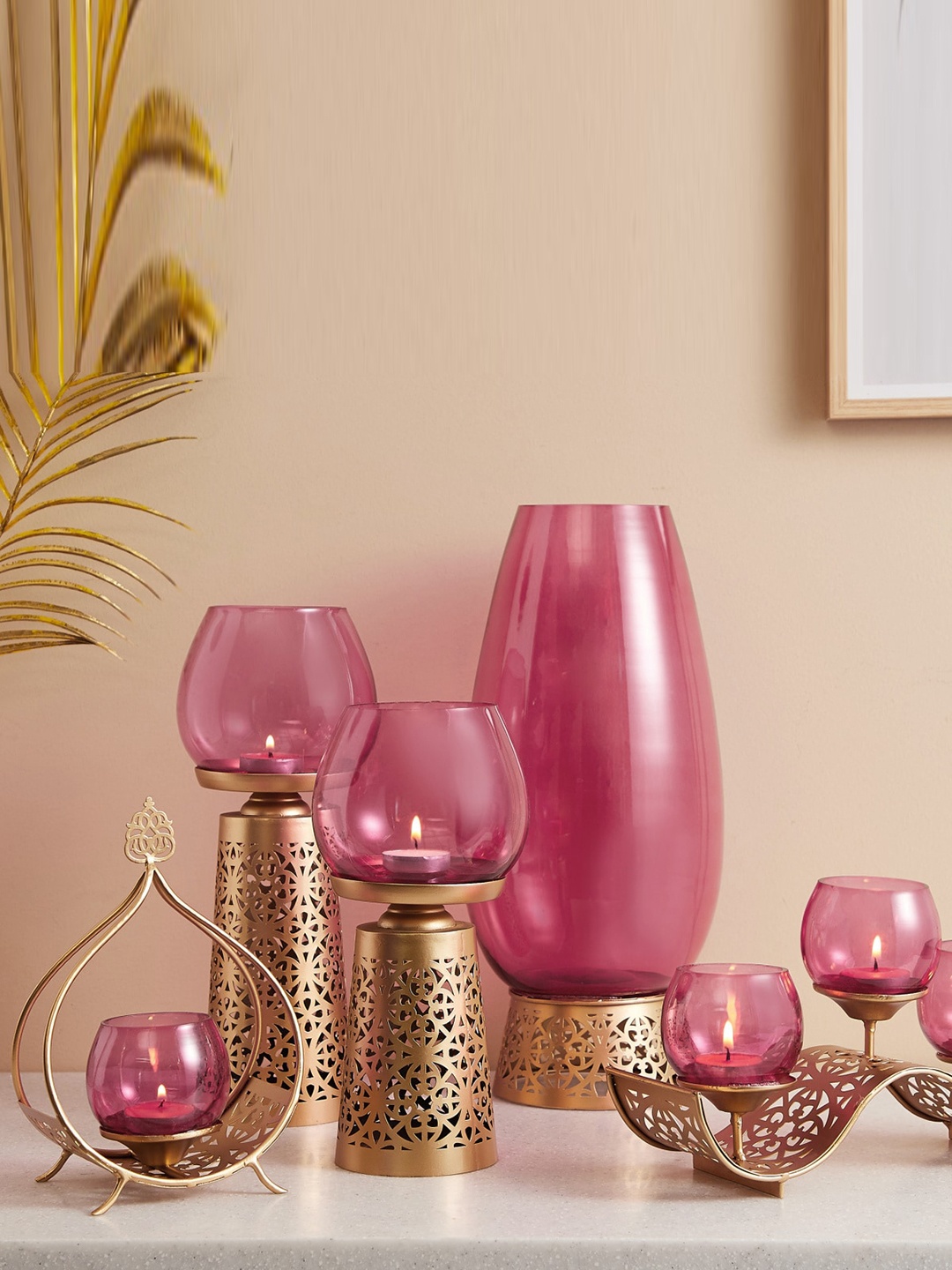

Home Centre Rylee Pink & Gold-Toned Glass Vase With Cut-Out Design Iron Base