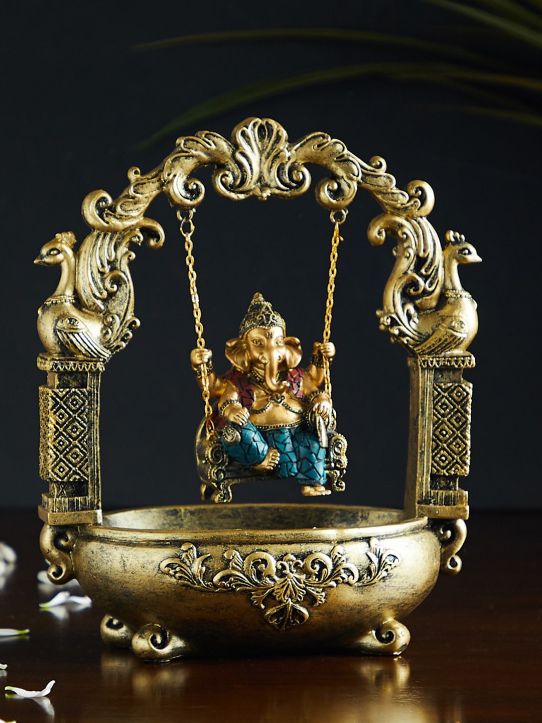 

Home Centre Alpana Gold-Toned Textured Ganesha On Swing Showpiece