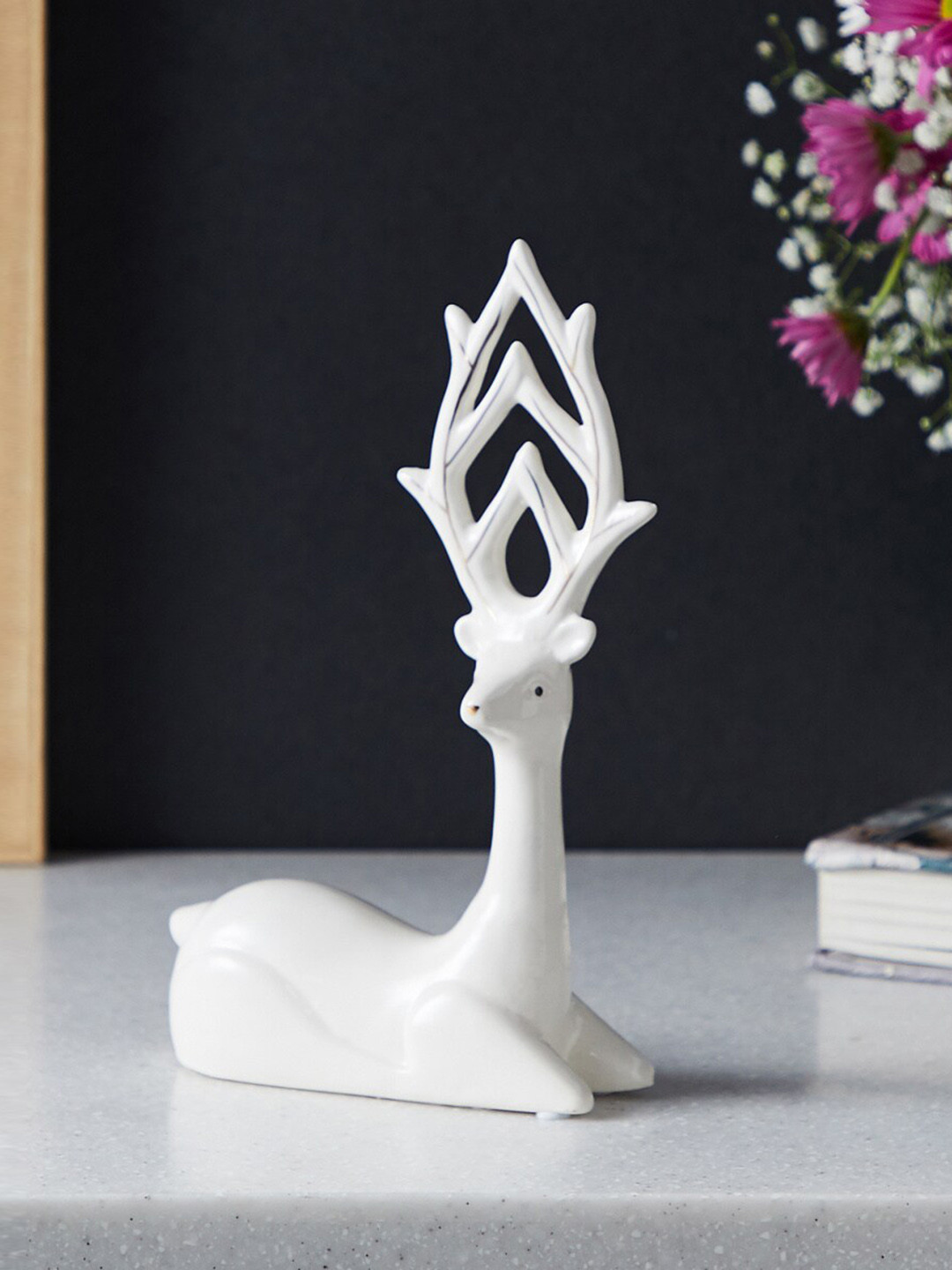 

Home Centre White Textured Sitting Reindeer Ceramic Showpiece