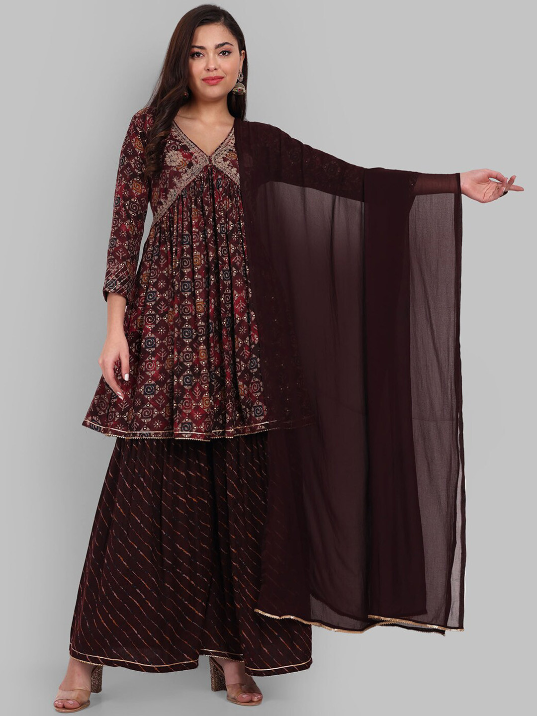 

Pakiza Ethnic Printed Pleated Zari Sequinned A-Line Kurti with Skirt & Dupatta, Maroon
