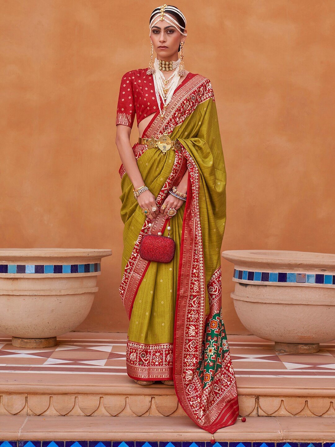 

Anouk Ethnic Motifs Woven Design Zari Patola Saree, Olive