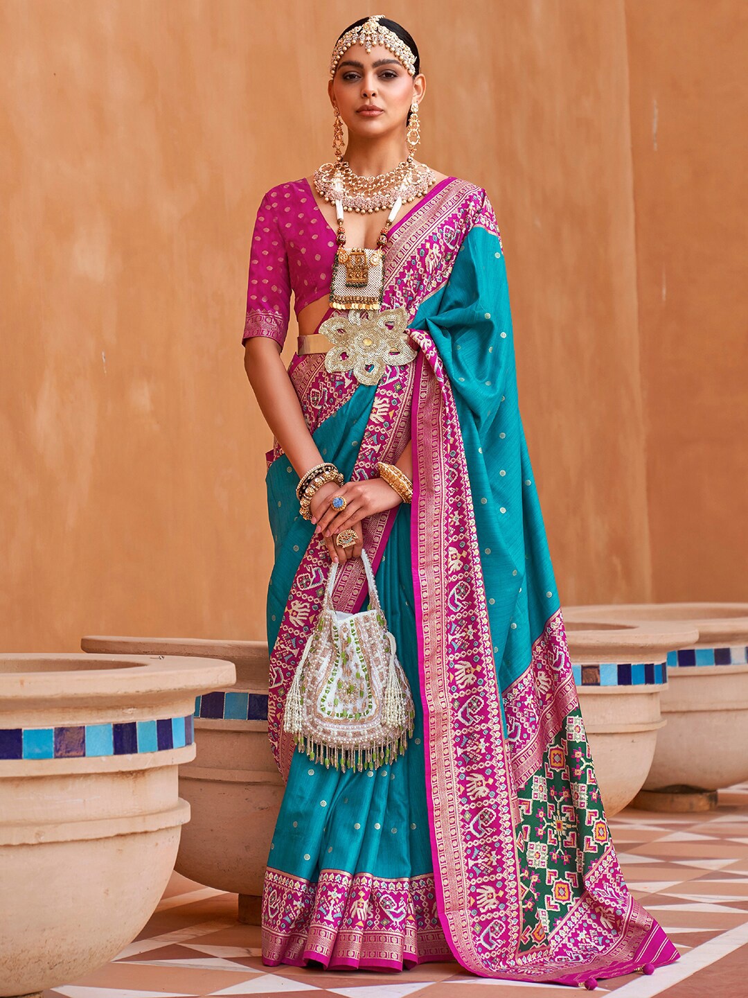 

Anouk Polka Dots Woven Design Zari Patola Saree, Blue