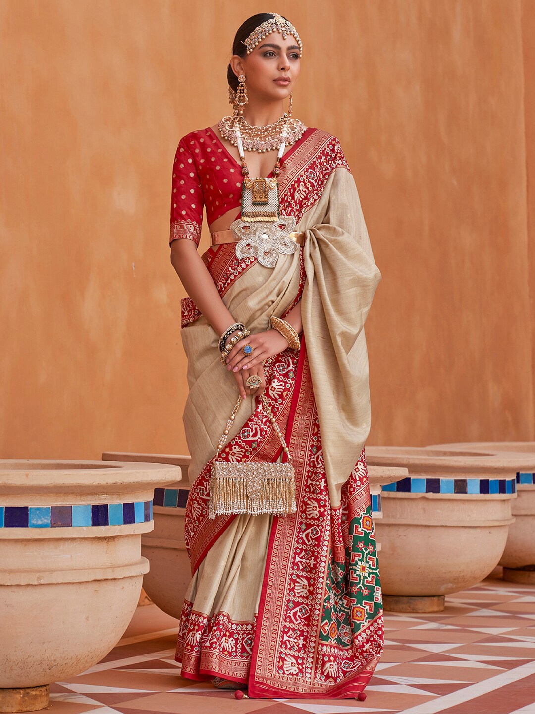 

Anouk Cream-Coloured & Red Woven Design Zari Silk Blend Patola Saree