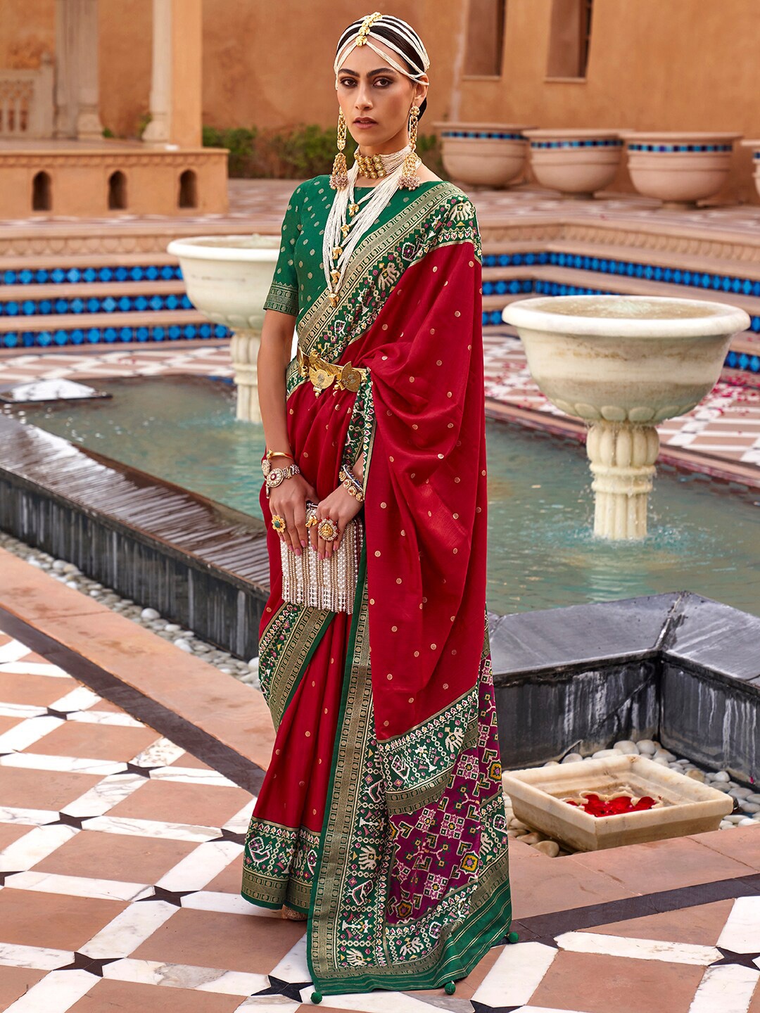 

Anouk Ethnic Motifs Woven Design Zari Patola Saree, Red