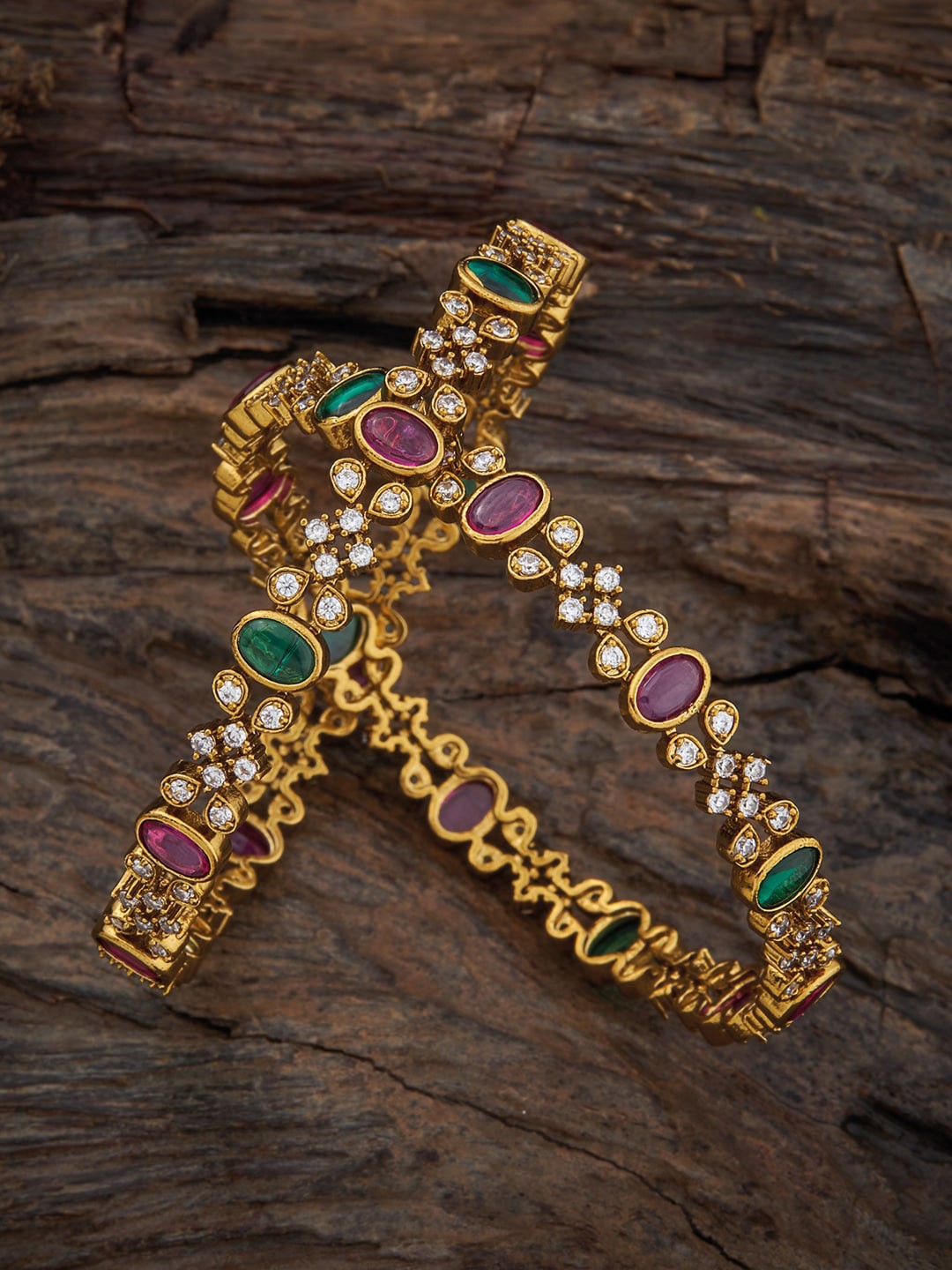 

Kushal's Fashion Jewellery Gold-Plated Stone-Studded Bangle