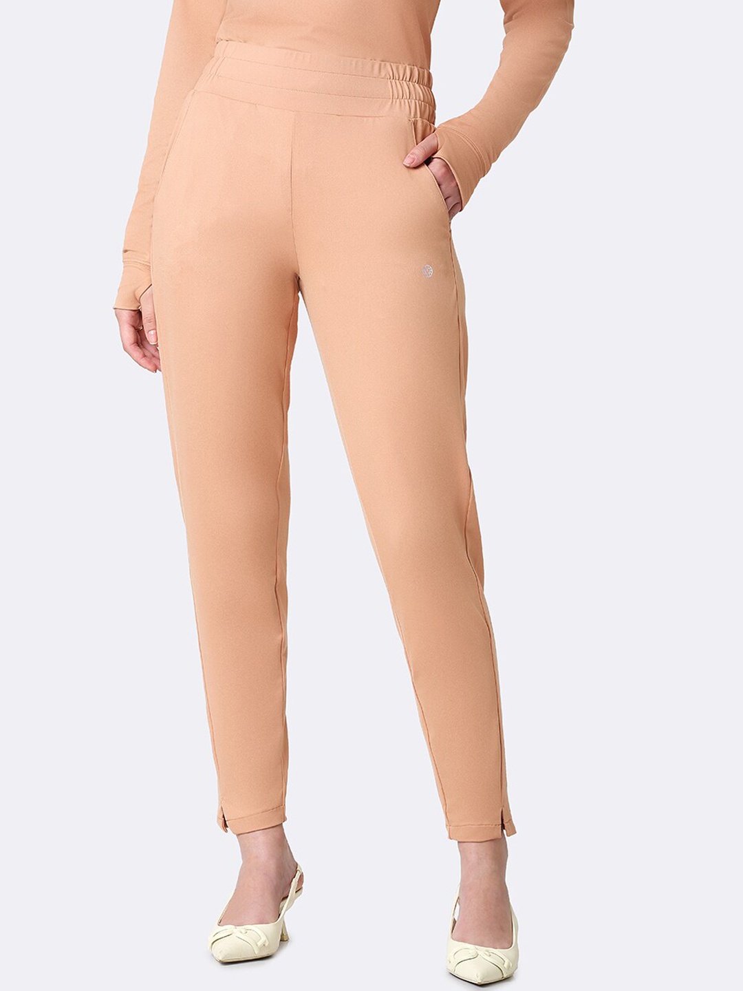 

Van Heusen Women Athleisure Antibacterial Moisture Wicking Track Pants, Peach