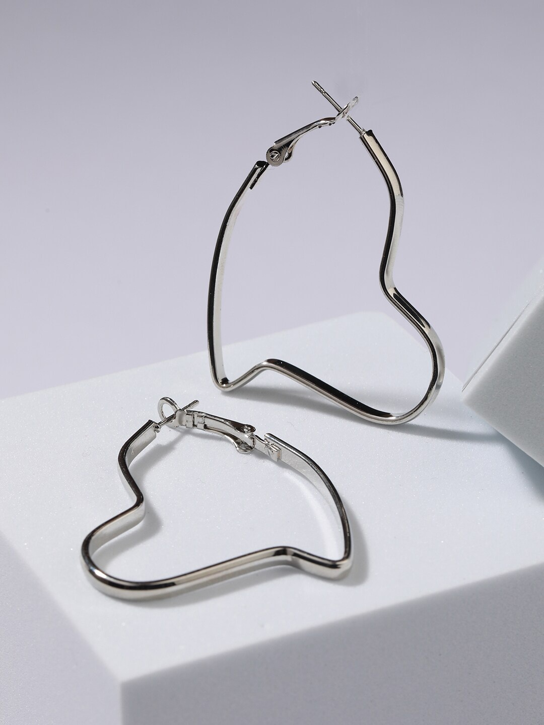 

Jazz and Sizzle Silver-Plated Heart Shaped Hoop Earrings