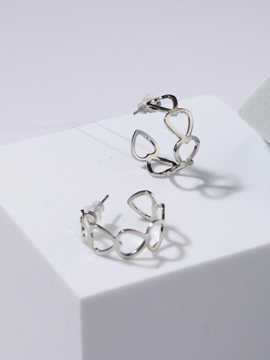 

Jazz and Sizzle Silver-Plated Heart Shaped Half Hoop Earrings