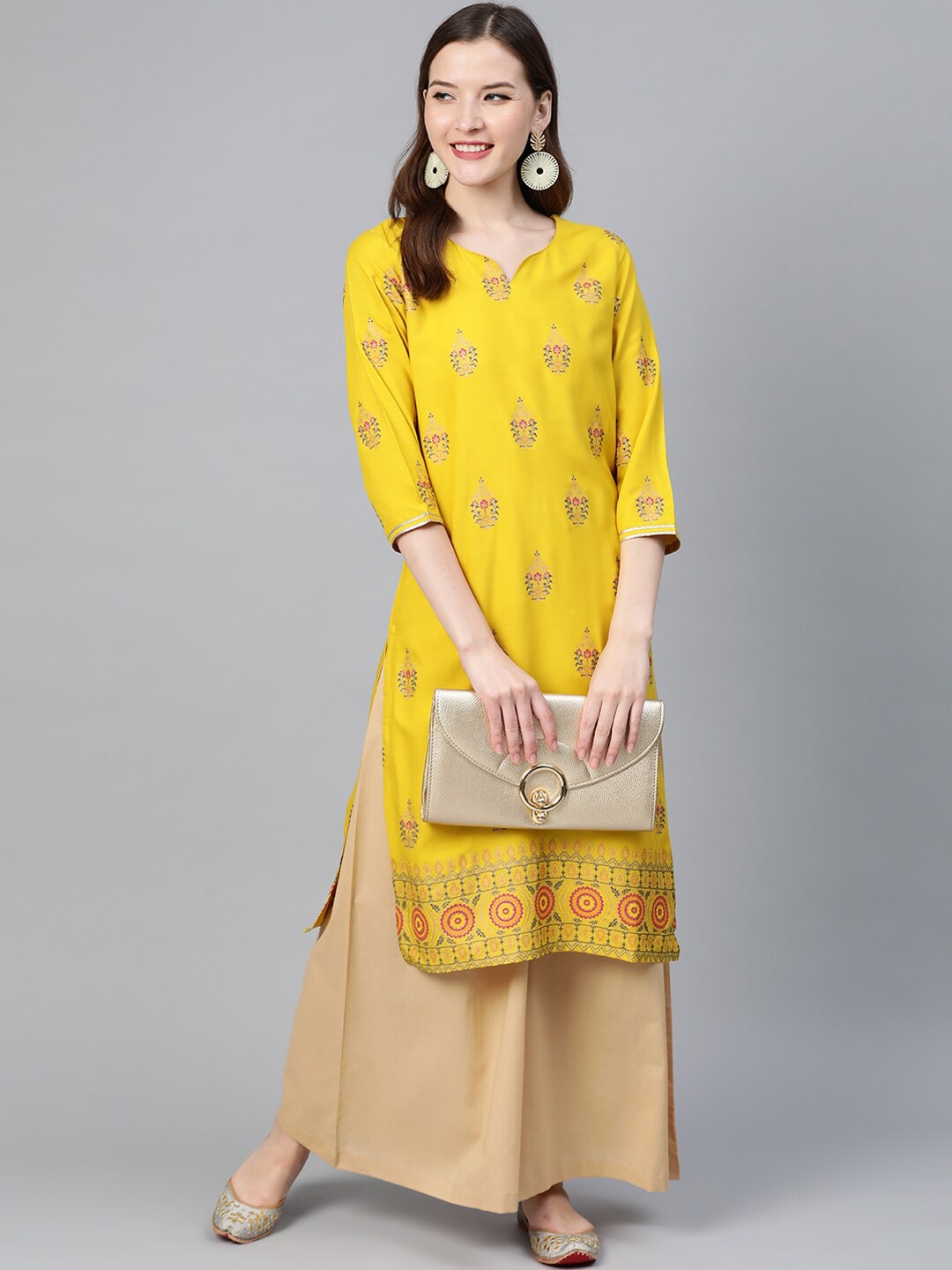 

Idalia Floral Printed Notched Neck Kurta with Palazzos, Mustard