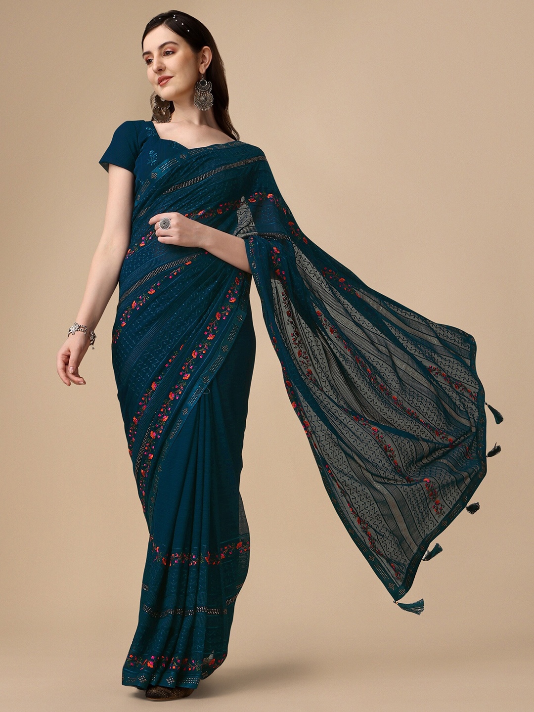 

Vaidehi Fashion Floral Embroidered Pure Chiffon Saree, Teal