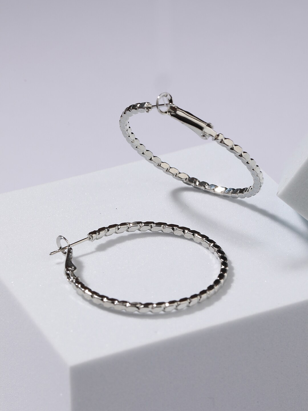 

Jazz and Sizzle Silver-Plated Circular Hoop Earrings
