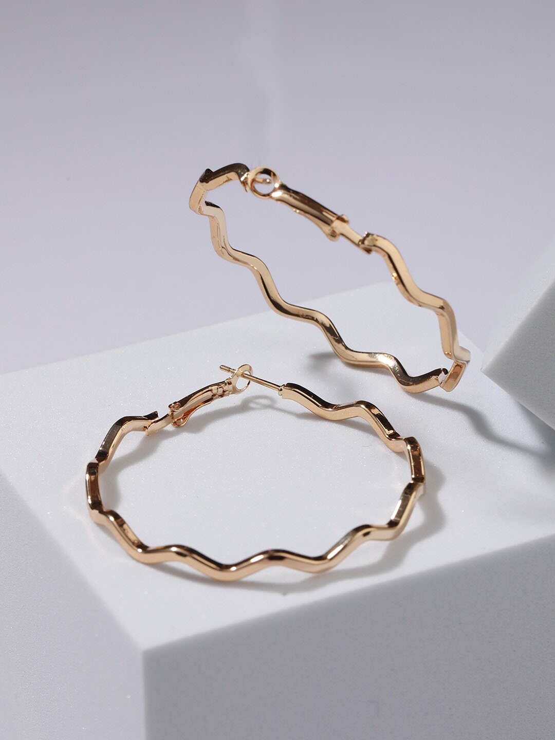 

Jazz and Sizzle Gold-Plated Circular Hoop Earrings