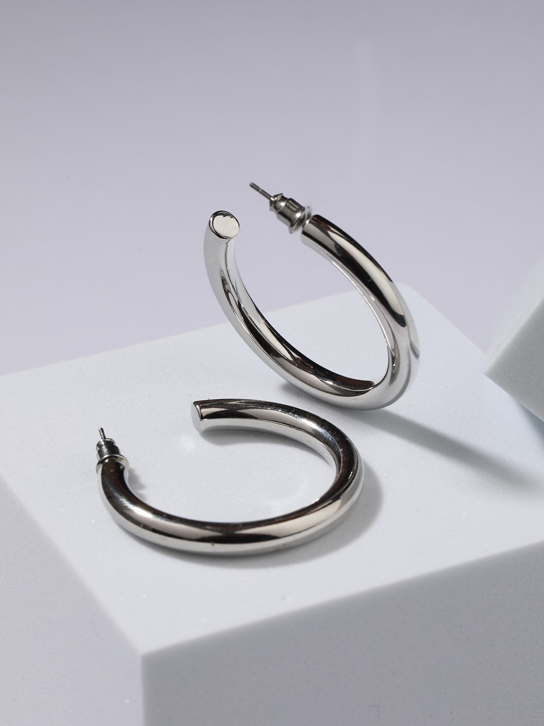 

Jazz and Sizzle Silver-Plated Contemporary Half Hoop Earrings