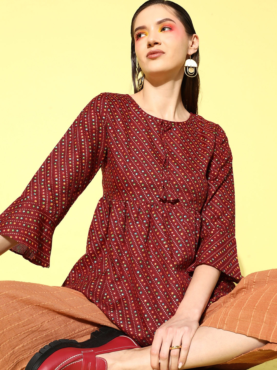 

Sangria Printed Bell Sleeve Ethnic Peplum Top, Maroon