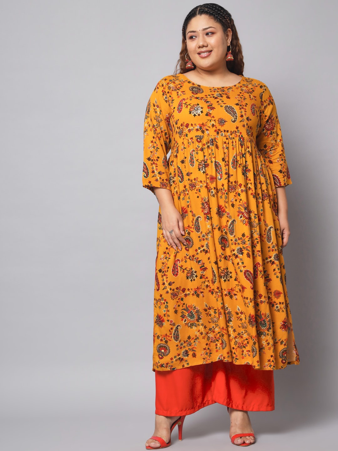 

Pankvi Plus Size Ethnic Motifs Printed Beads & Stones A-Line Kurta, Mustard