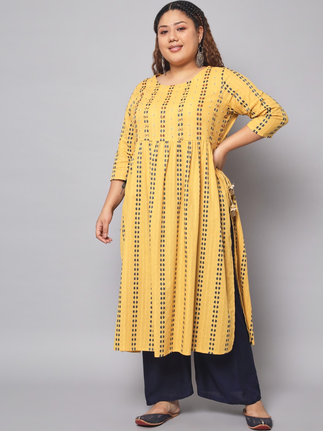 

Pankvi Plus Size Floral Embroidered Beads & Stones Pure Cotton A-Line Kurta, Mustard