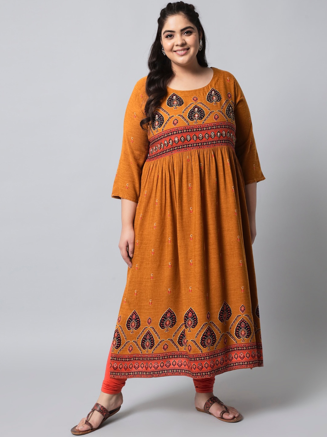 

Pankvi Plus Size Ethnic Motifs Printed Thread Work Beads & Stones A-Line Kurta, Mustard