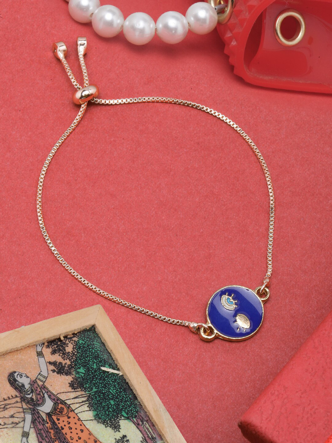 

DressBerry Women Brass Enamelled Rose Gold-Plated Charm Bracelet, Blue