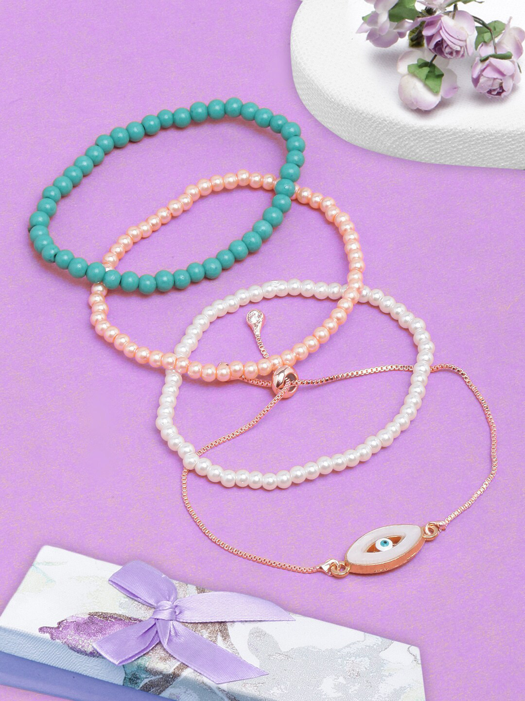 

DressBerry Women Set Of 4 Gold-Plated Charm Bracelet