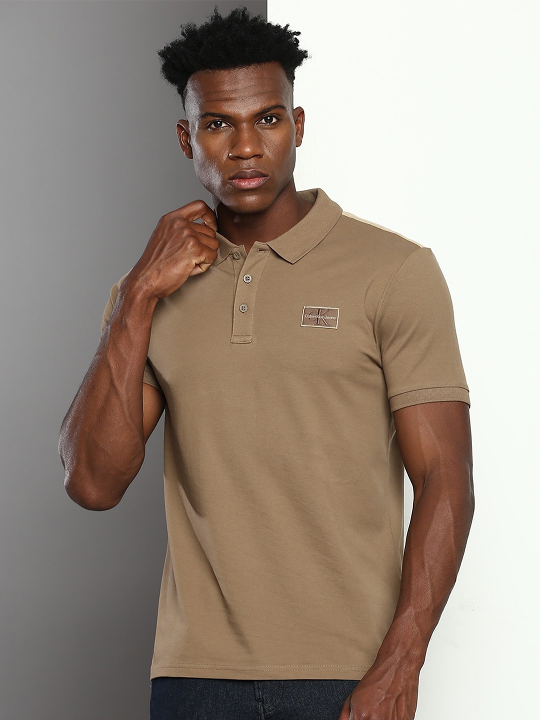 

Calvin Klein Jeans Polo Collar Slim Fit Cotton Lycra T-shirt, Brown