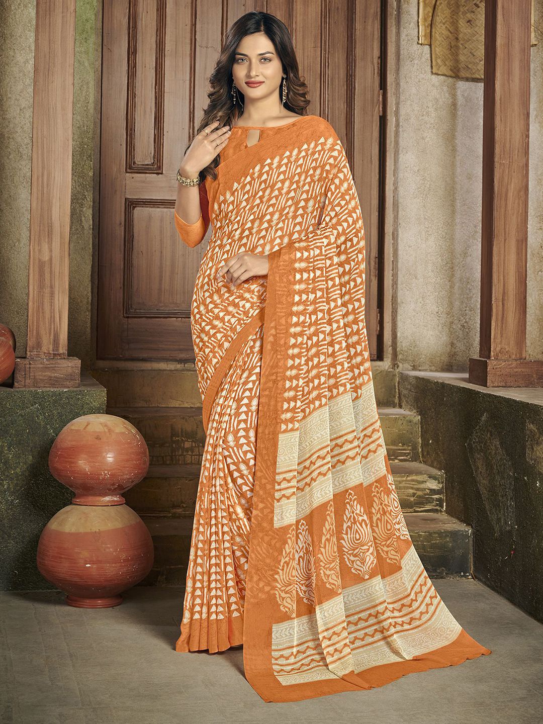 

Satrani Ethnic Motifs Printed saree, Orange