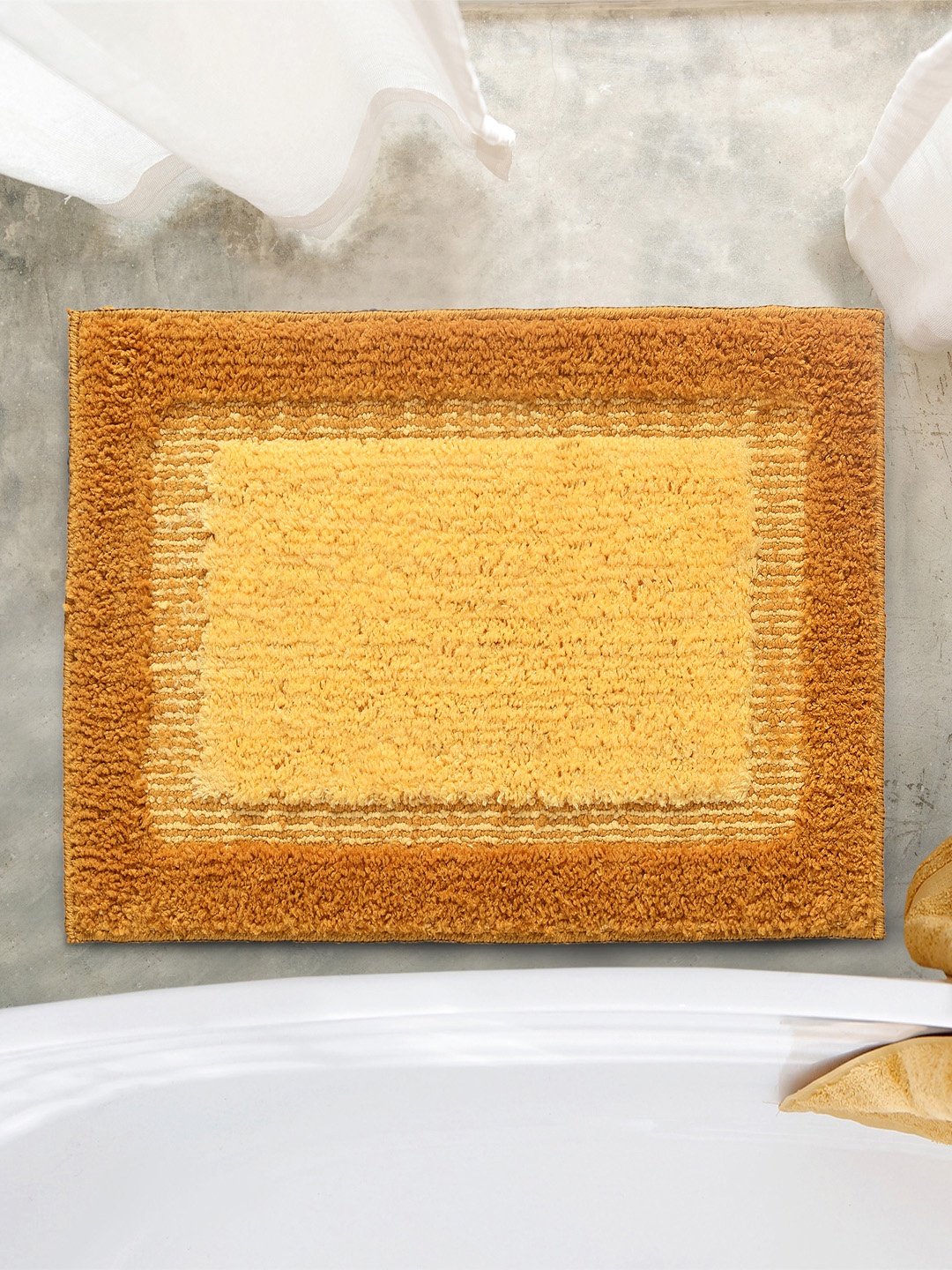 

Saral Home Yellow Textured Bath-Door Mat