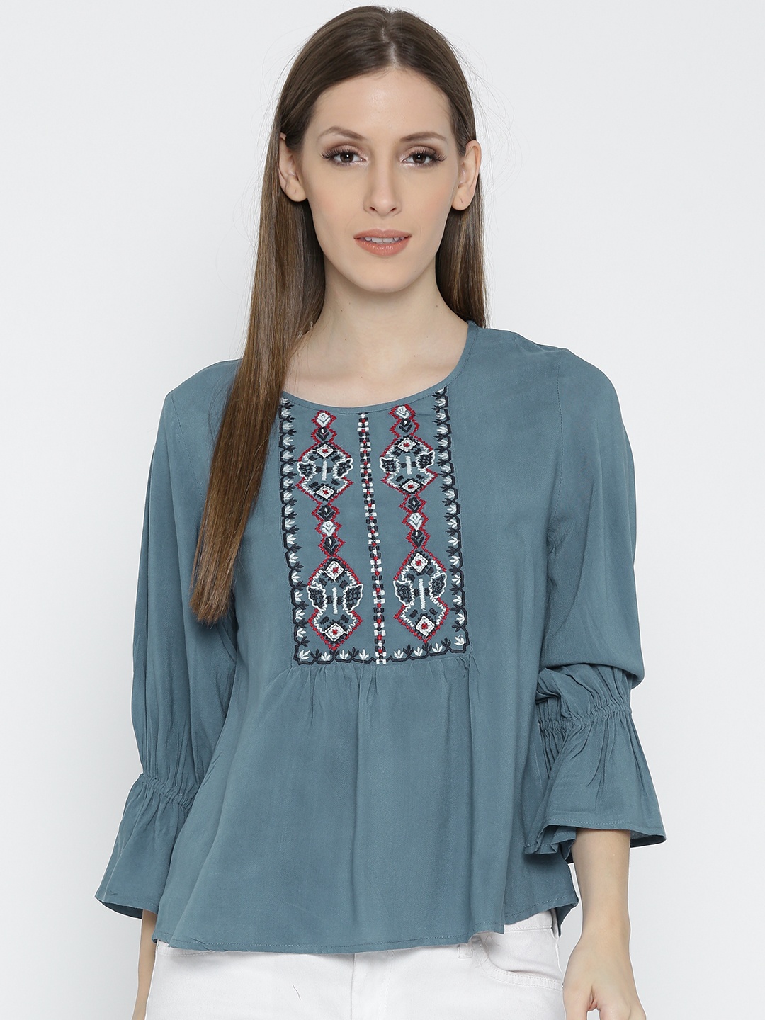 

Vaak Women Blue Embroidered A-Line Top