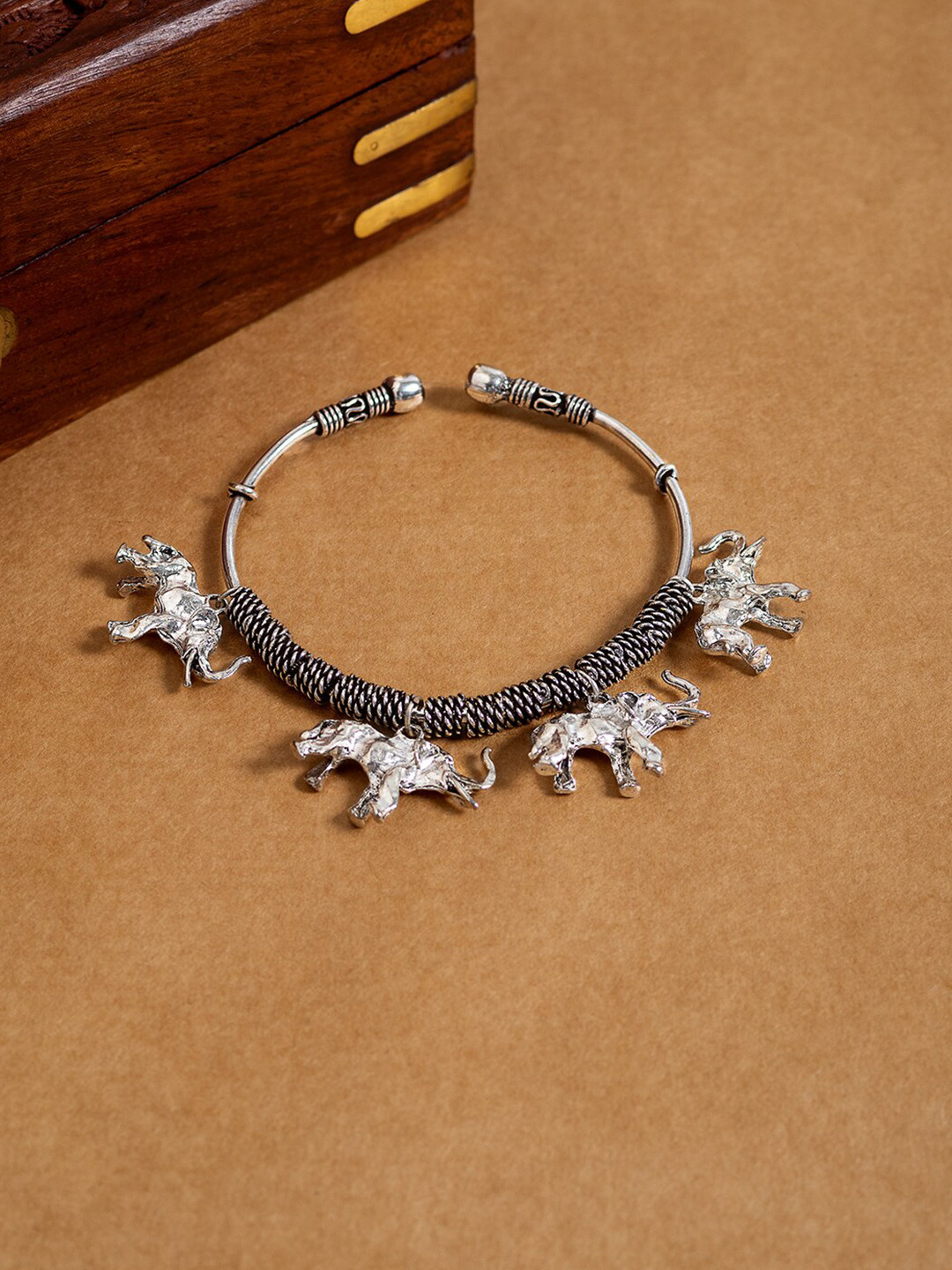 

Golden Peacock Women Oxidised Silver-Plated Cuff Bracelet