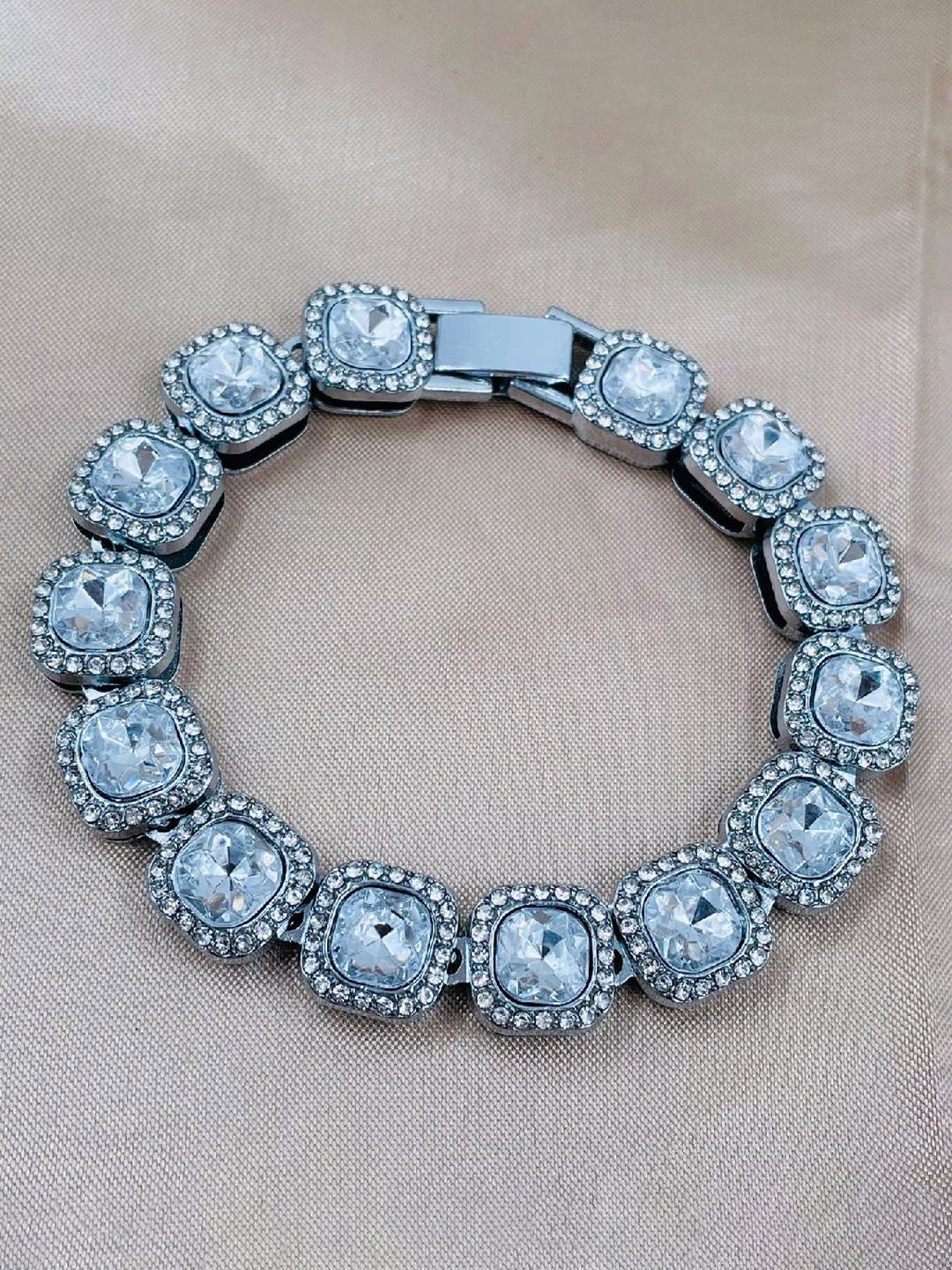 

ZIVOM Women Silver-Toned & White Crystals Silver-Plated Link Bracelet