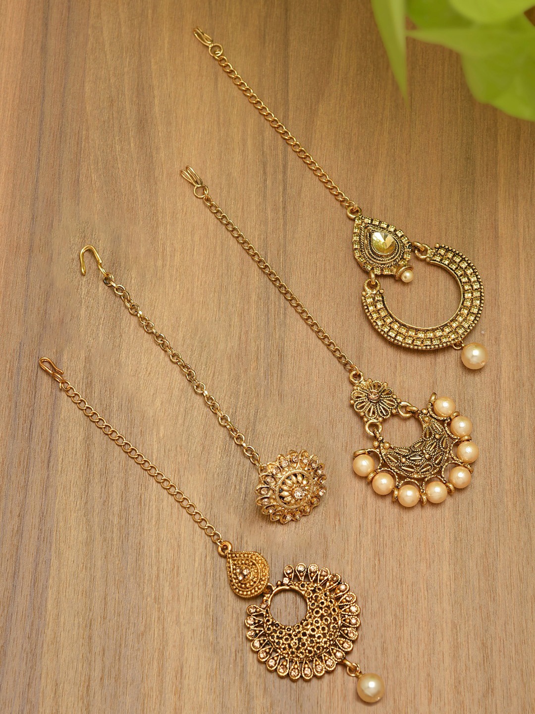 

Zaveri Pearls Set of 4 Antique Gold-Plated Stone-Studded Maang Tikkas