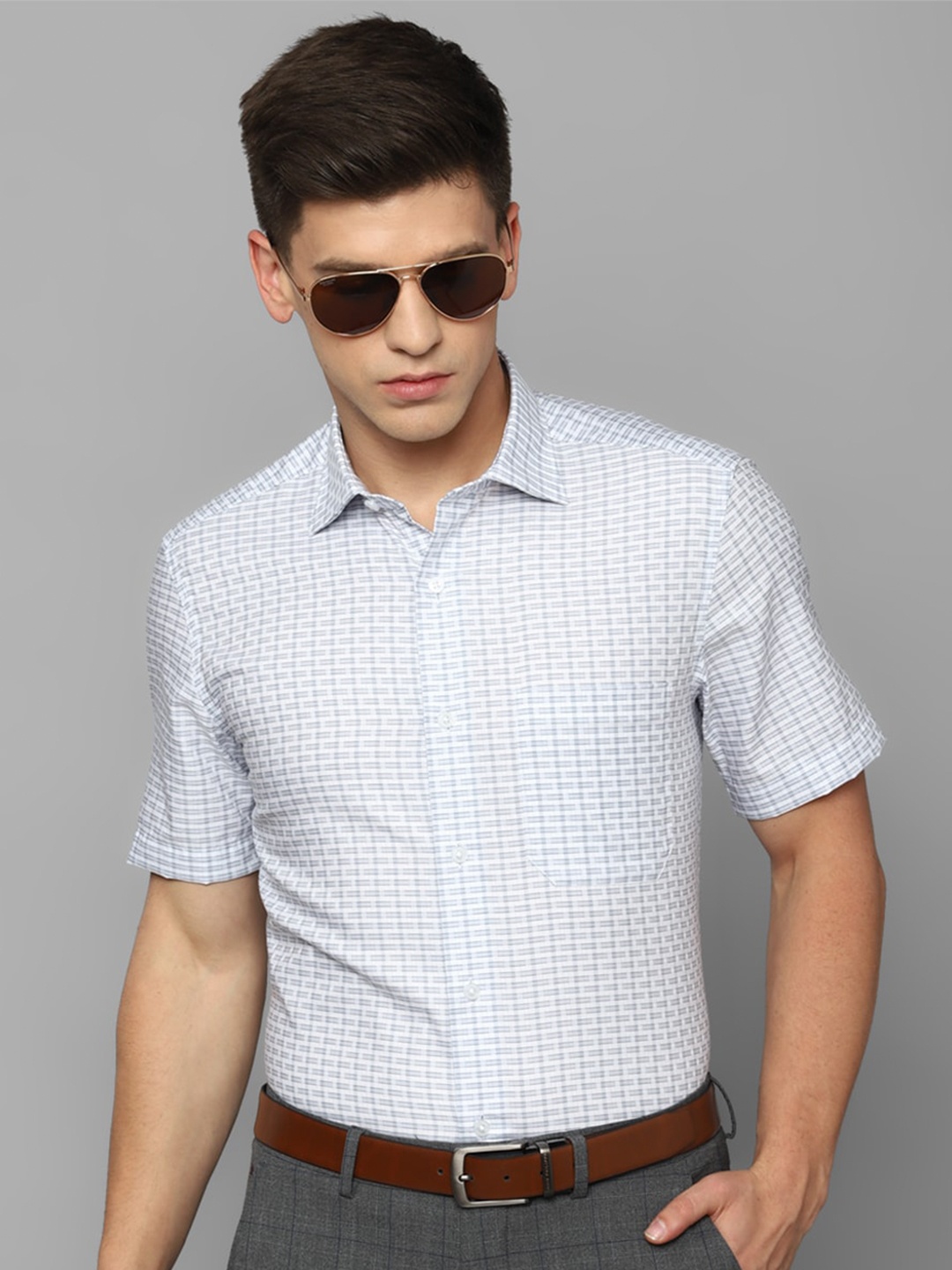 

Louis Philippe Men Blue Opaque Checked Formal Shirt