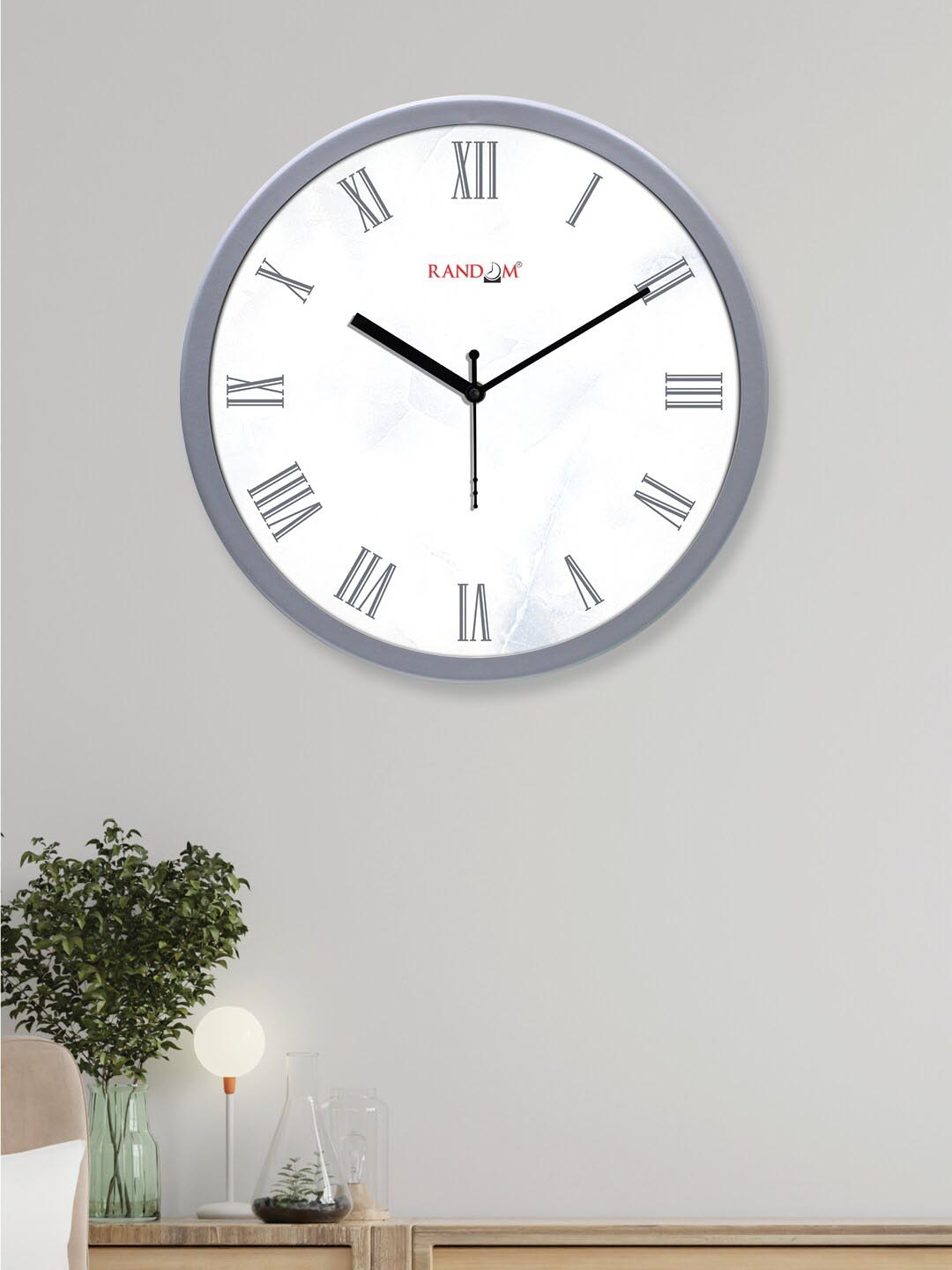

RANDOM White & Silver-Toned Analogue Contemporary Round Wall Clock