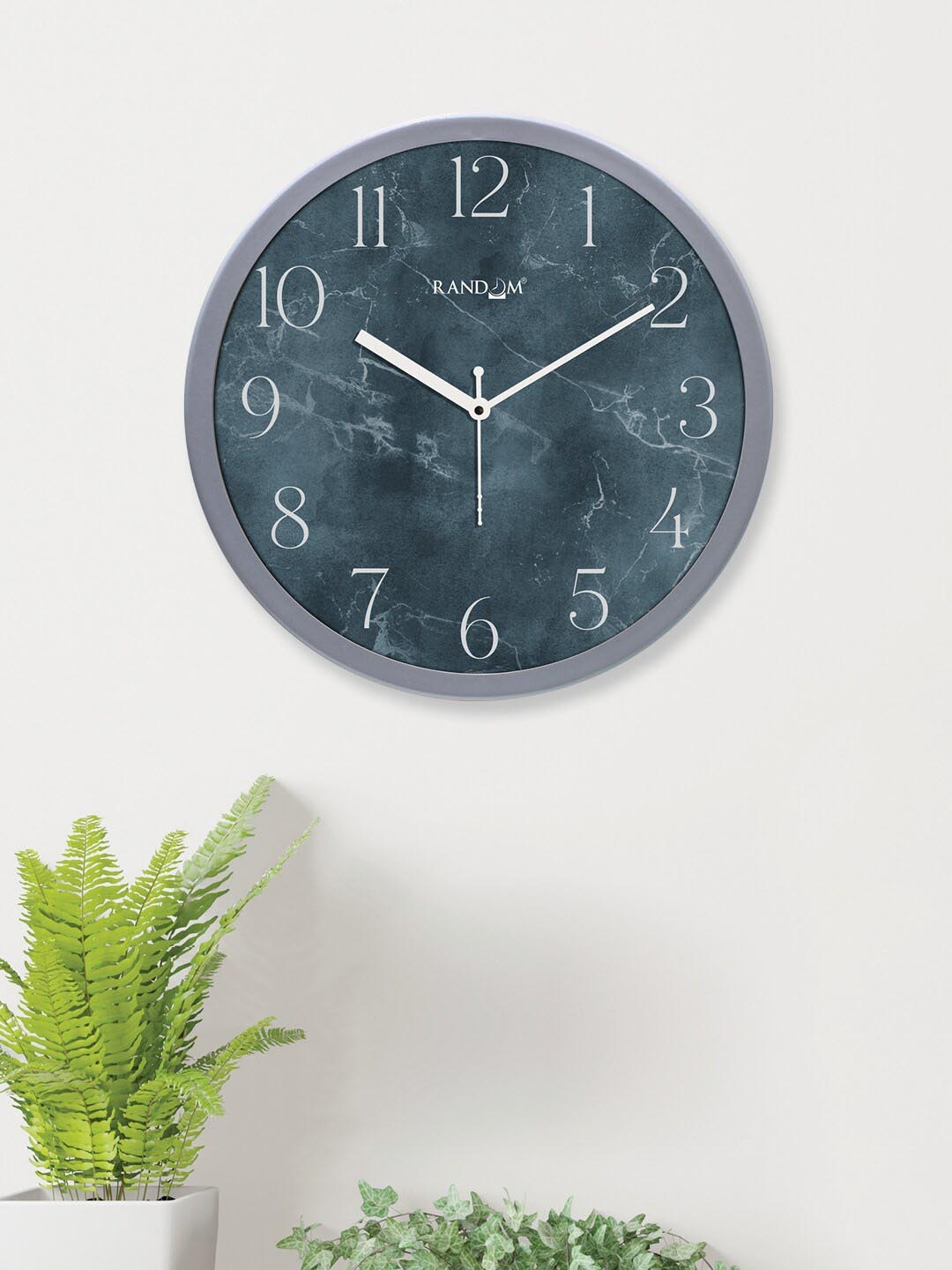 

RANDOM Teal & Silver-Toned Printed Analogue Contemporary Round Wall Clock