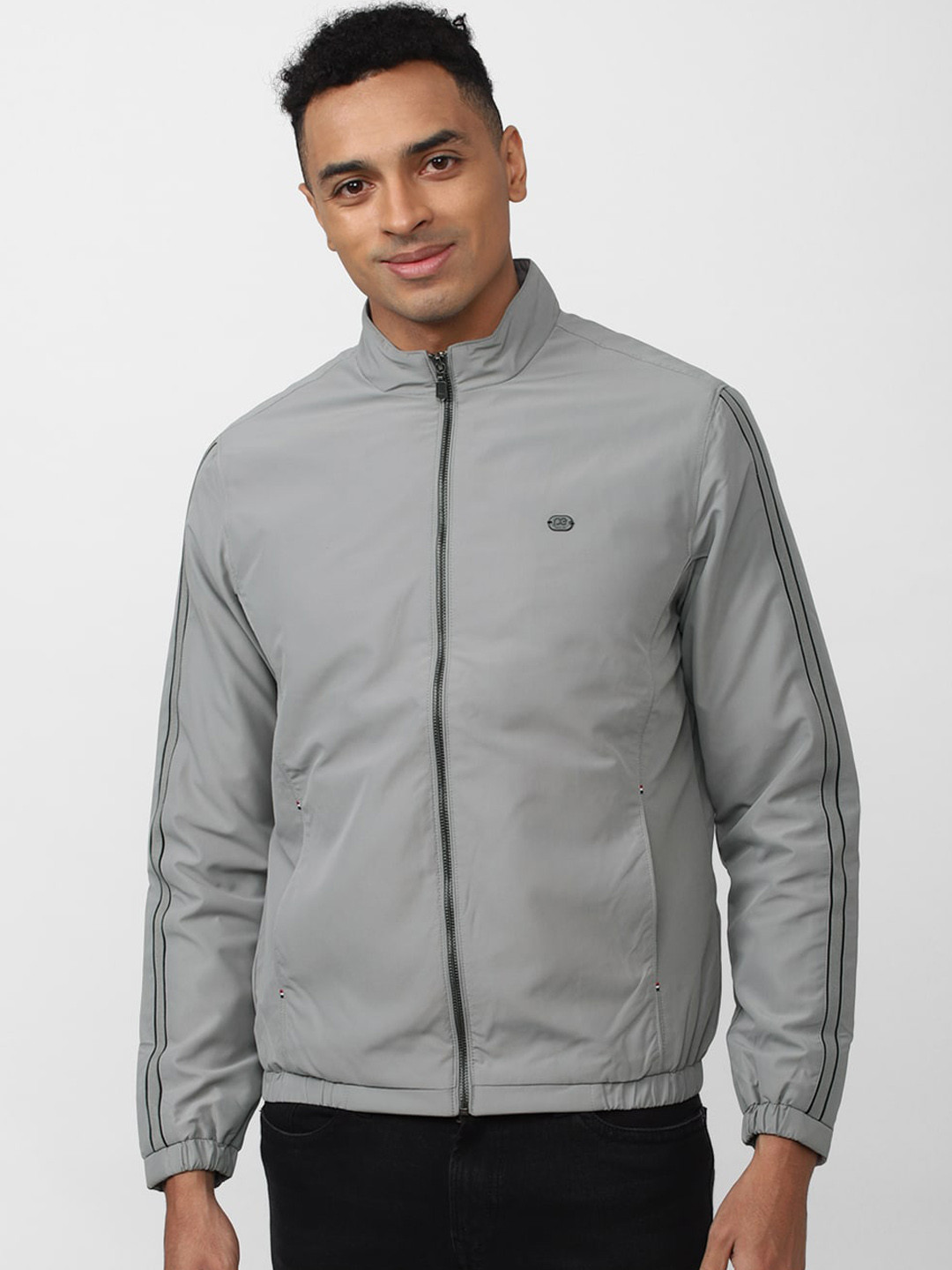 

Peter England Casuals Men Mock Collar Sporty Jacket, Grey
