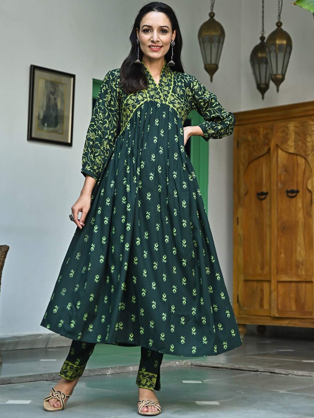 

Rustorange Floral Printed Puff Sleeves A-Line Pleated Kurta with Trousers, Green