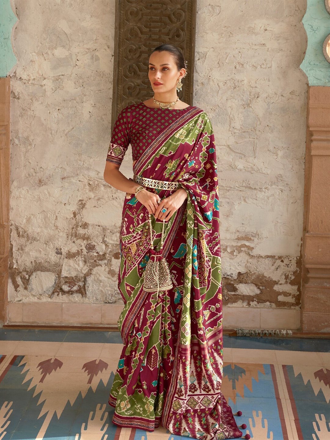 

Mitera Ethnic Motifs Beads and Stones Embellished Pure Silk Patola Saree, Maroon