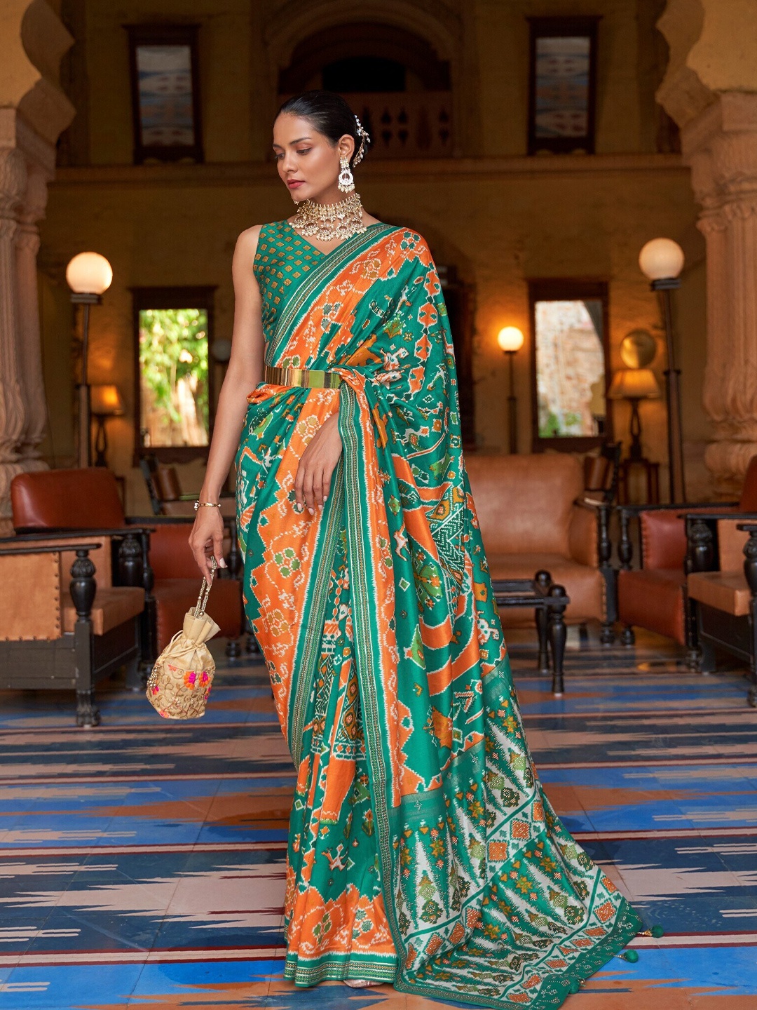 

Mitera Ethnic Motifs Beads and Stones Embellished Pure Silk Patola Saree, Orange