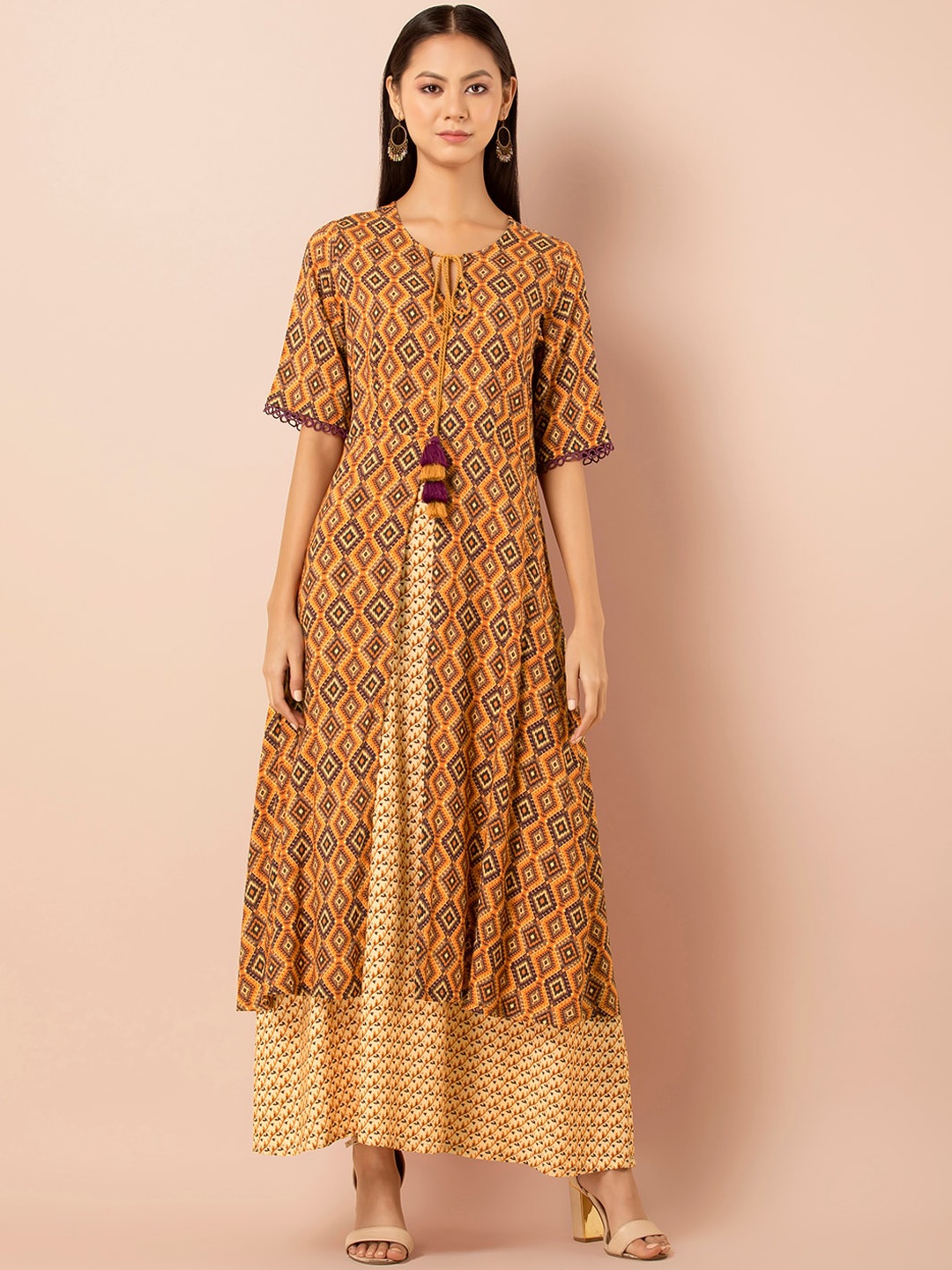 

INDYA Ethnic Motifs Printed Tie Up Neck Layered Kurta, Yellow