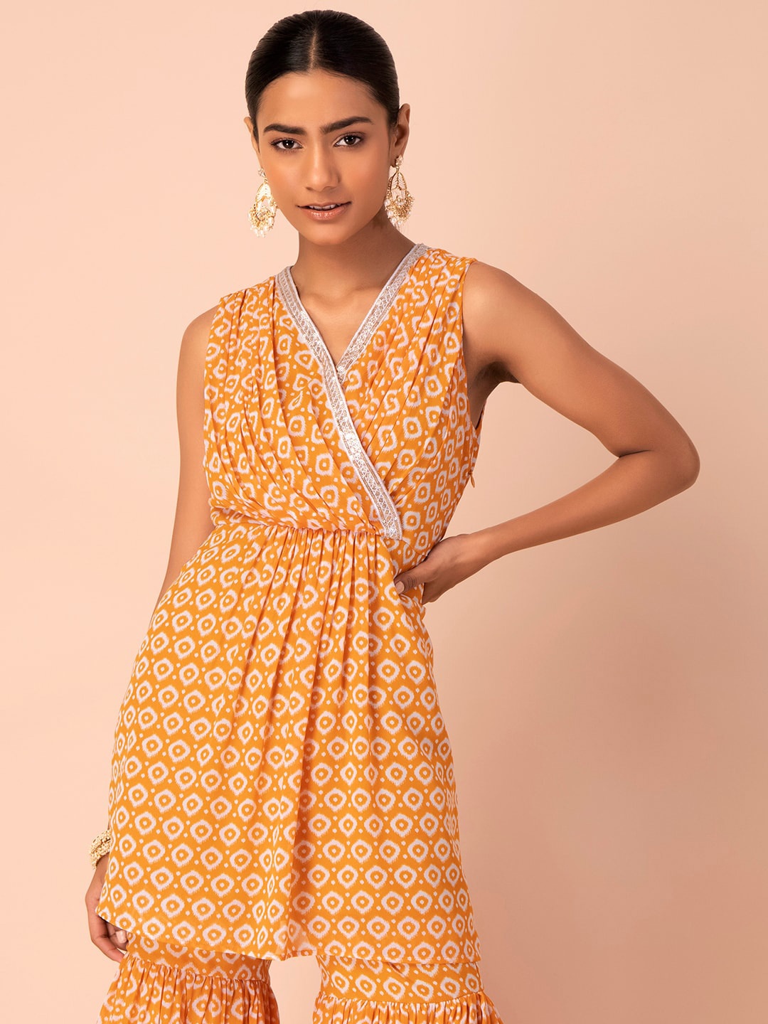 

INDYA Geometric Printed V Neck Sequinned Anarkali Kurtis, Yellow