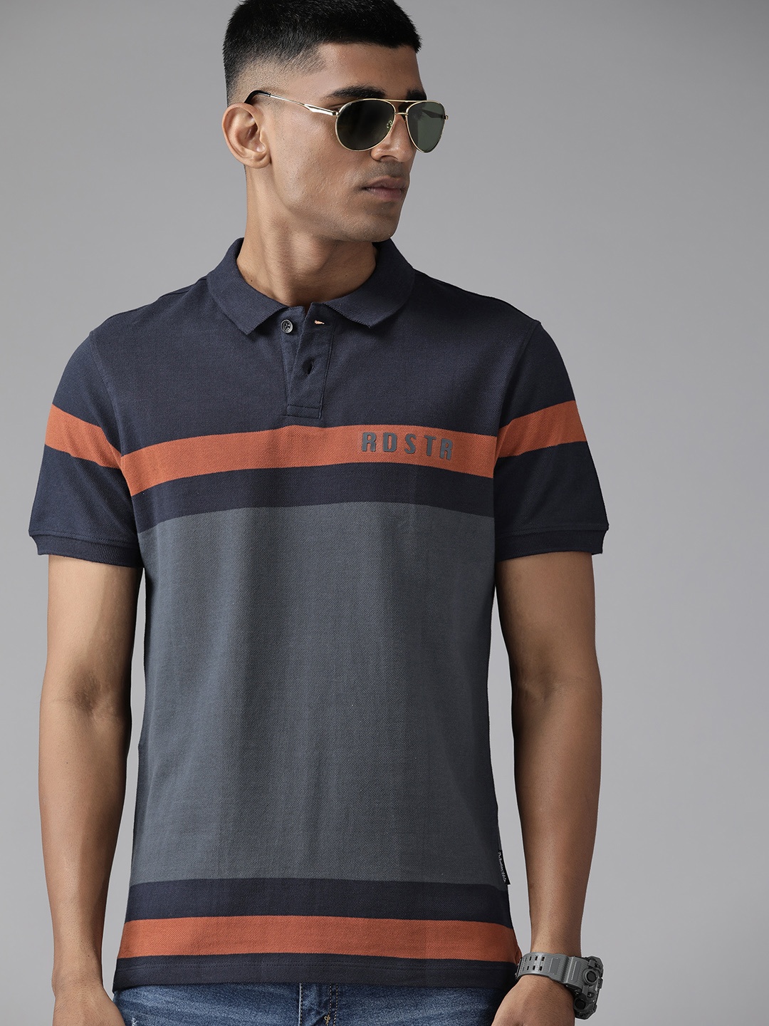 

Roadster Men Colourblocked Polo Collar T-shirt, Blue