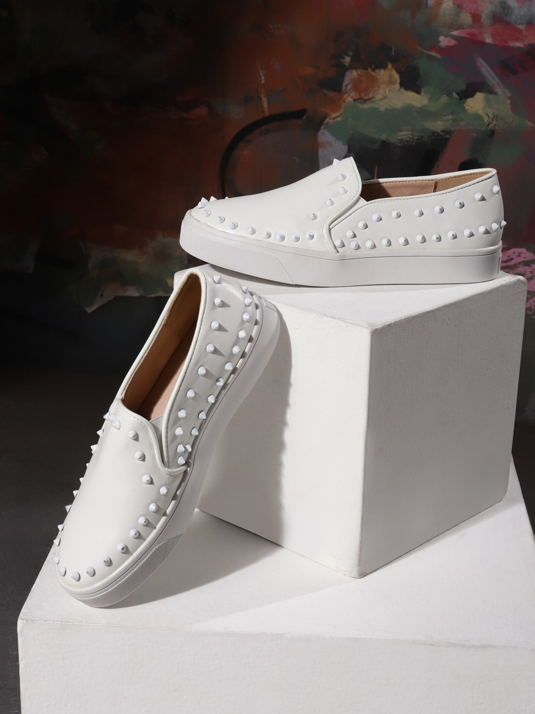 

Truffle Collection Women Studded Slip On Sneakers, Off white