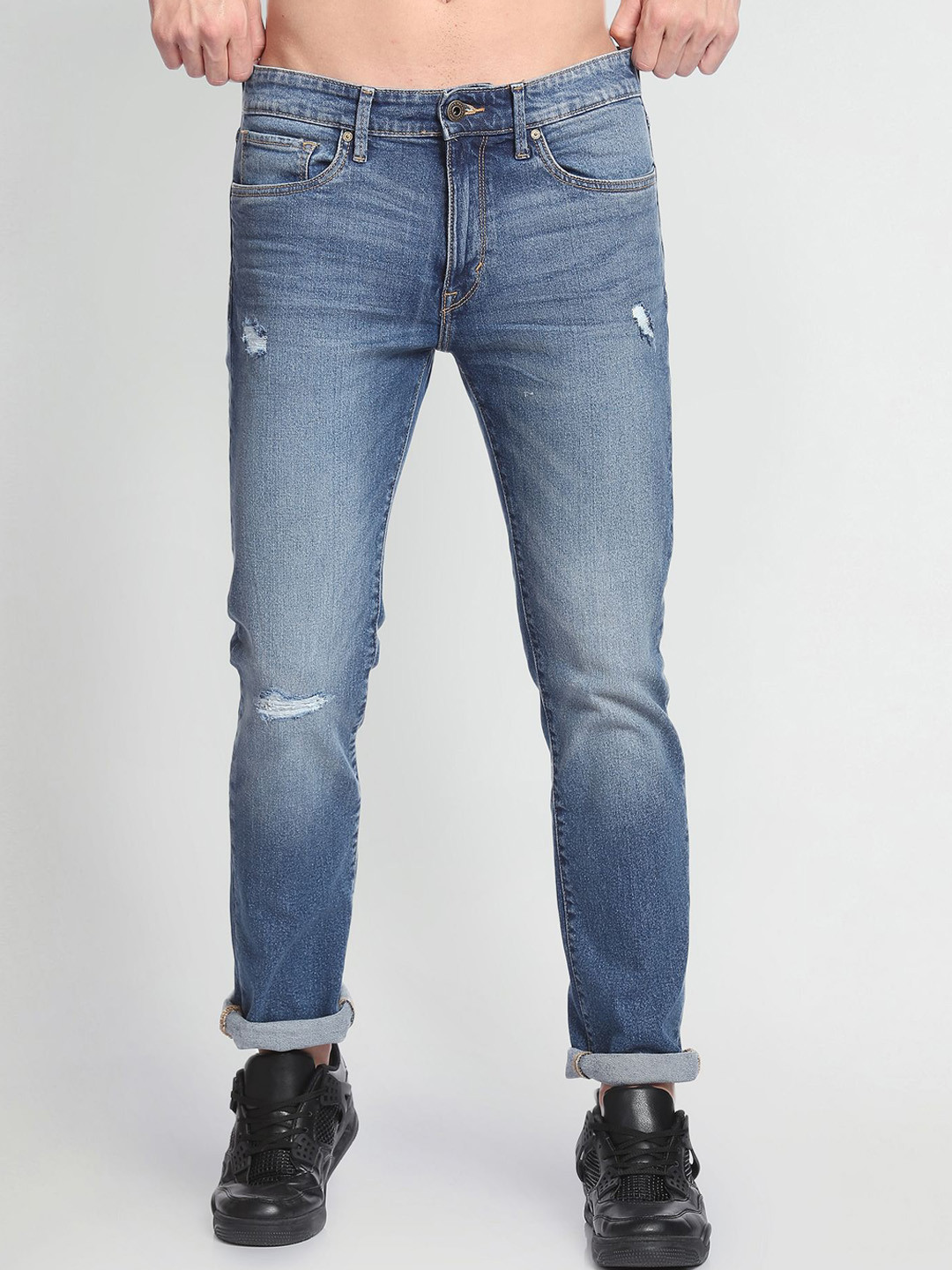 

Flying Machine Men Tapered Fit Low Distress Heavy Fade Mid-Rise Stretchable Jeans, Blue