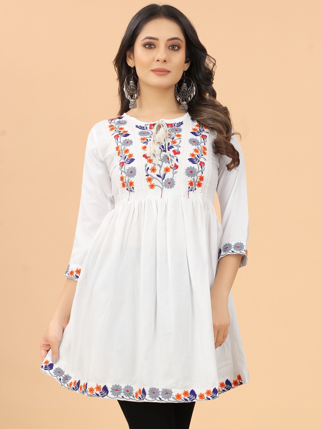 

Vaidehi Fashion Floral Embroidered Cotton Tunic, White