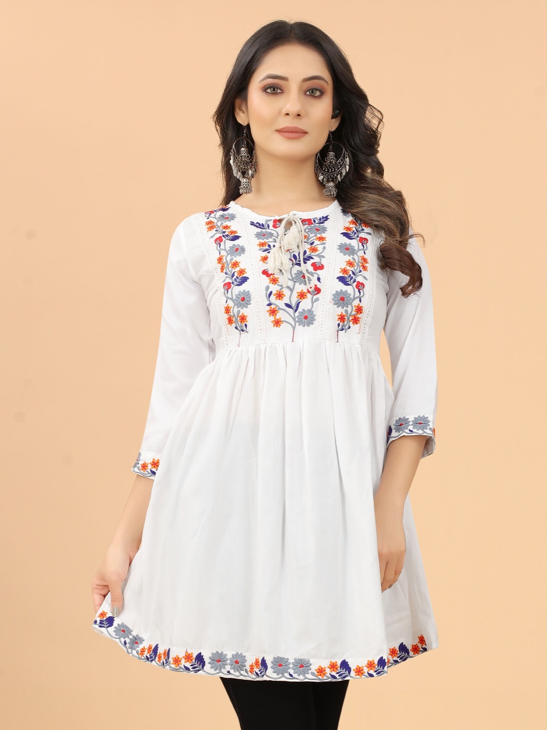 

Vaidehi Fashion Floral Embroidered Cotton Tunic, White