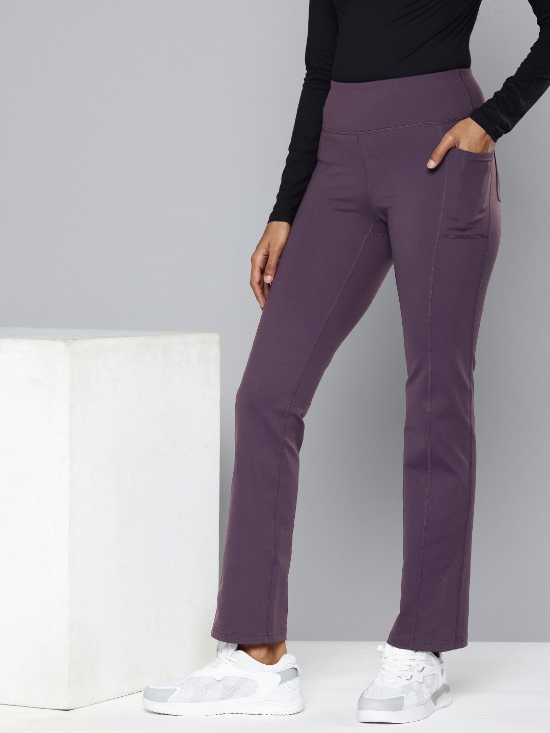 

Skechers Women Solid High-Rise Track Pants, Purple