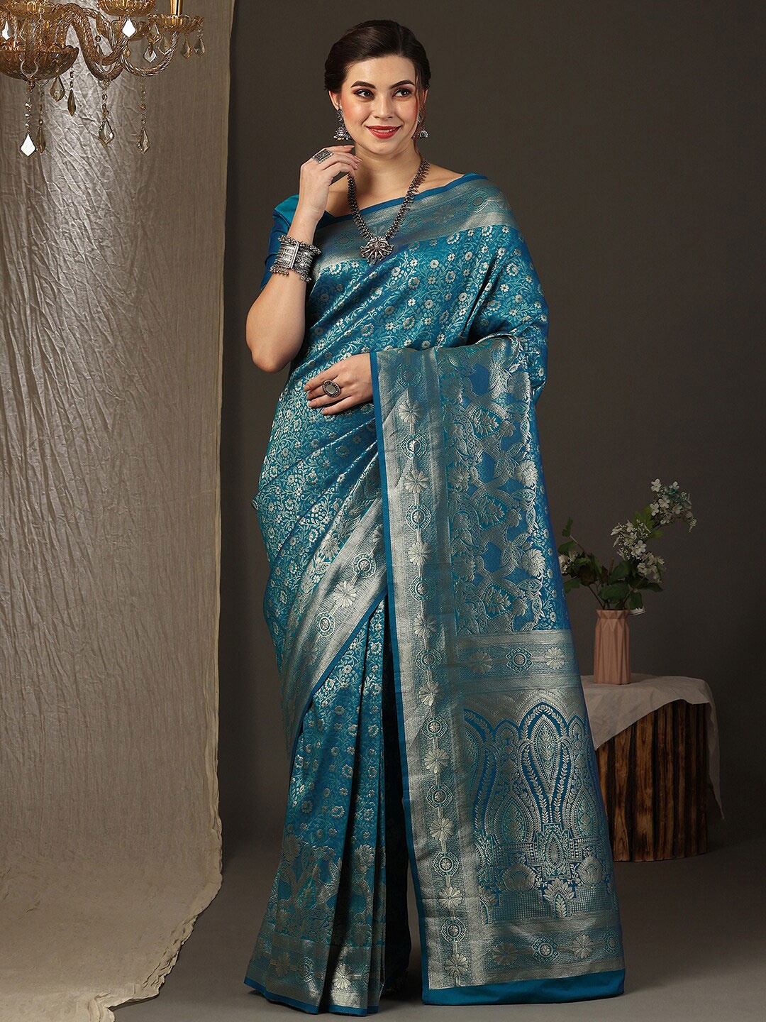 

Anouk Floral Woven Design Zari Silk Blend Kanjeevaram Saree, Blue