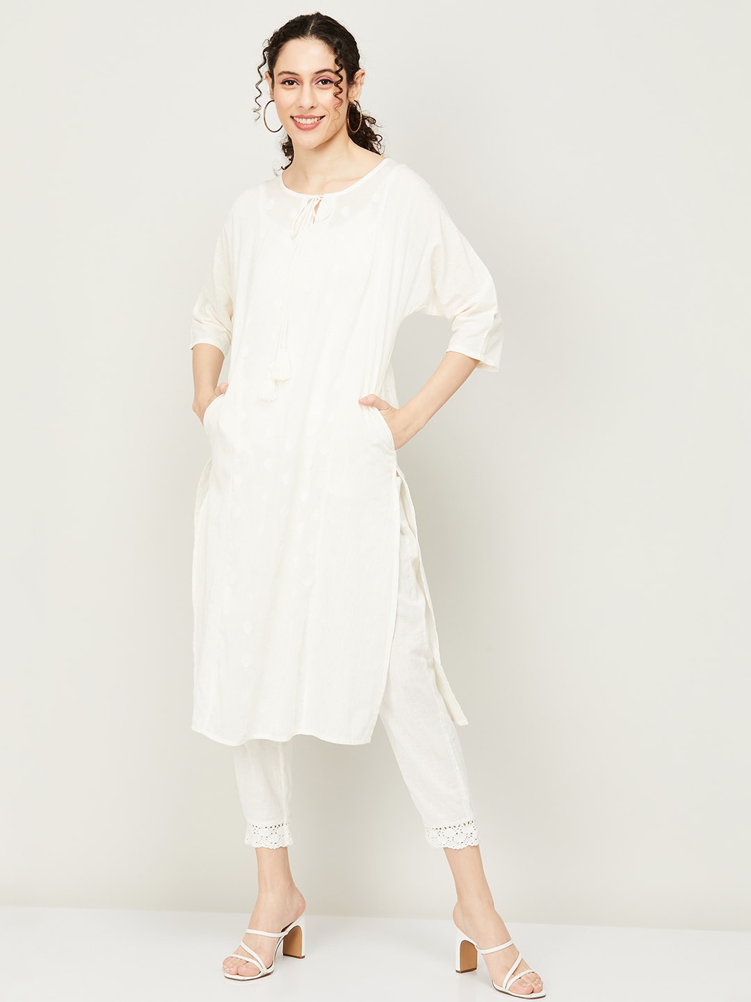 

Melange by Lifestyle Tie-Up Neck Striped Pure Cotton Kurta, Off white