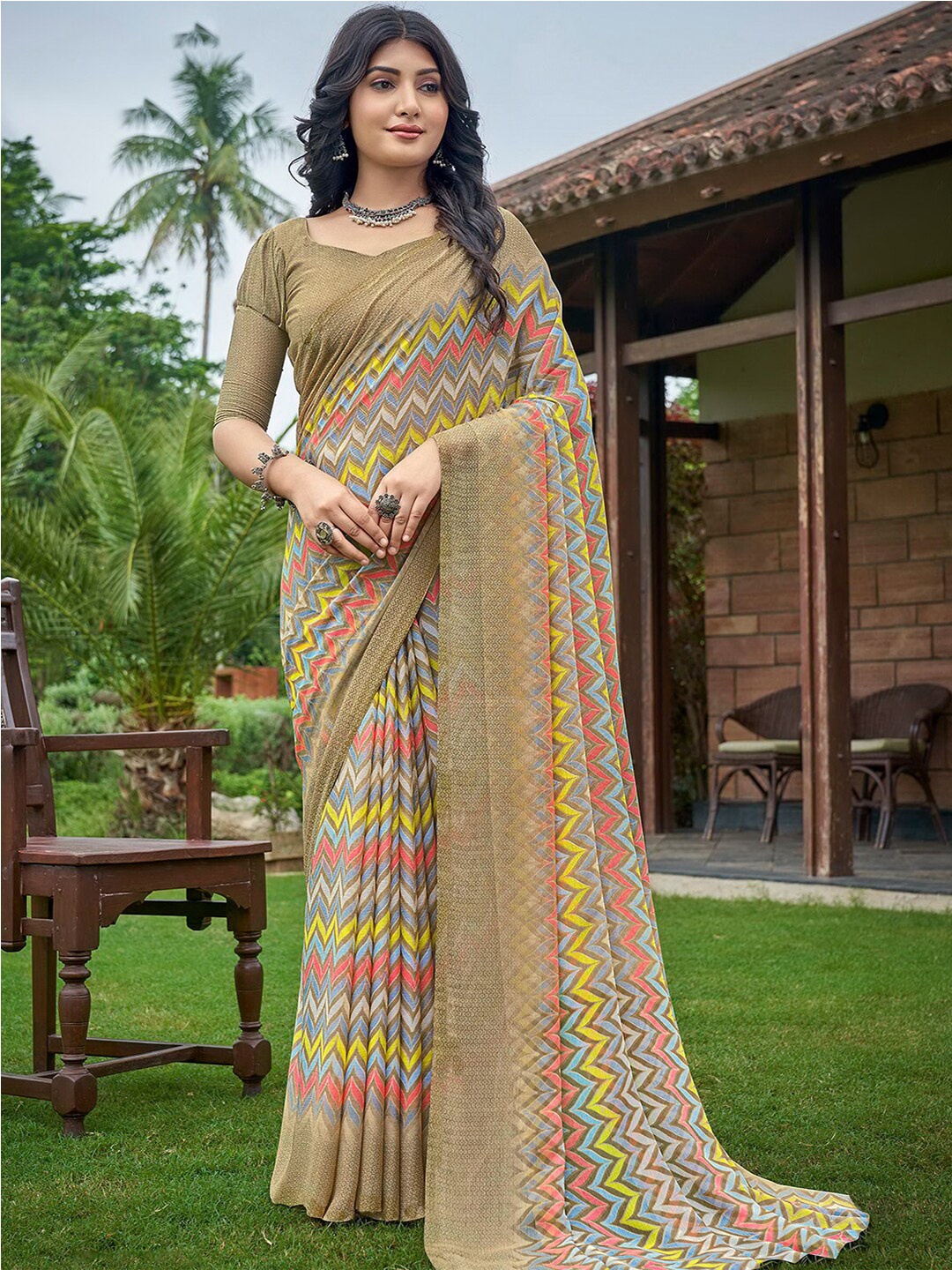 

Kasak Ethnic Motifs Printed Poly Chiffon Block Print Saree, Beige