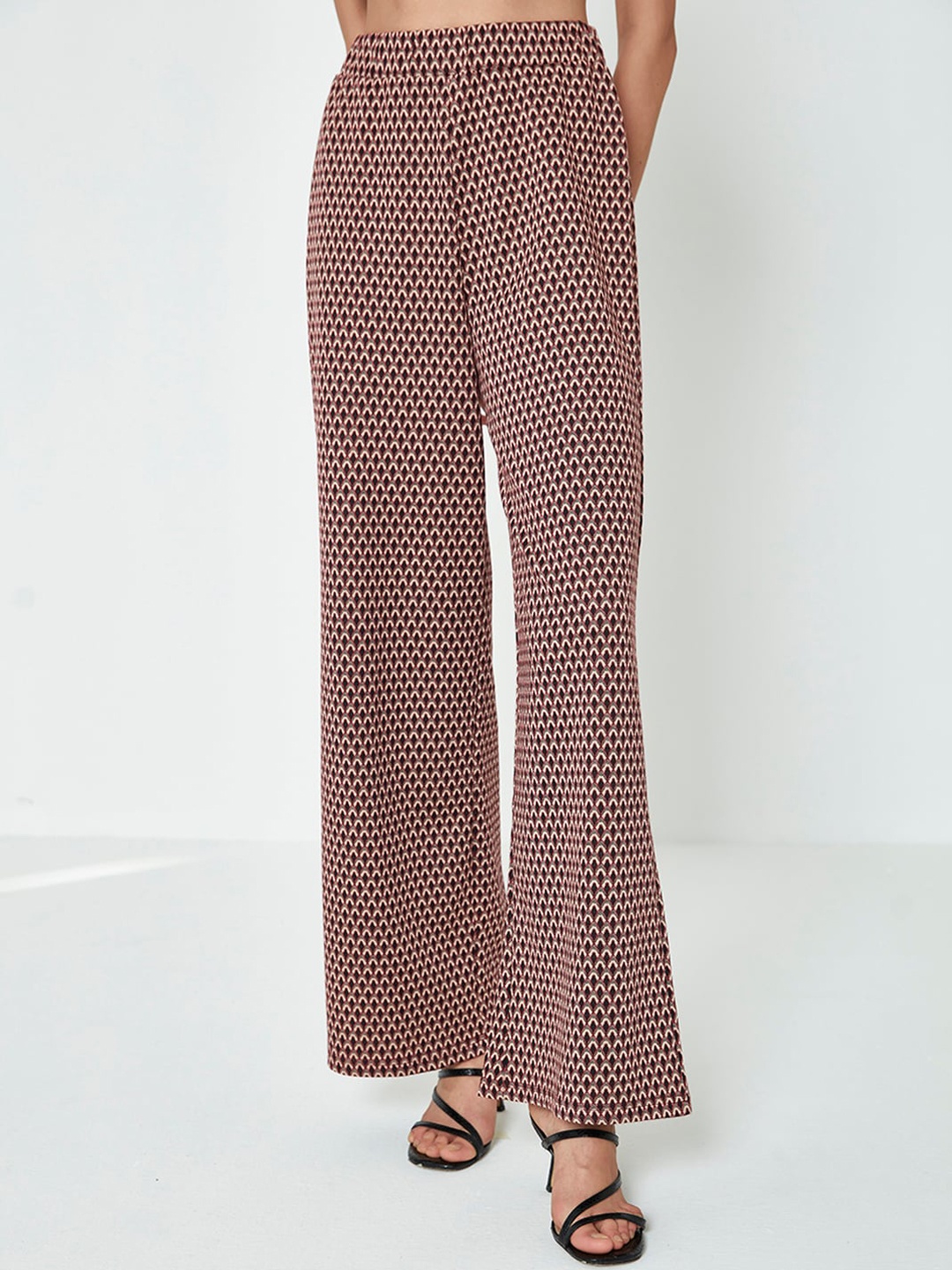 

COVER STORY Women Printed Flared Parallel Trousers, Maroon